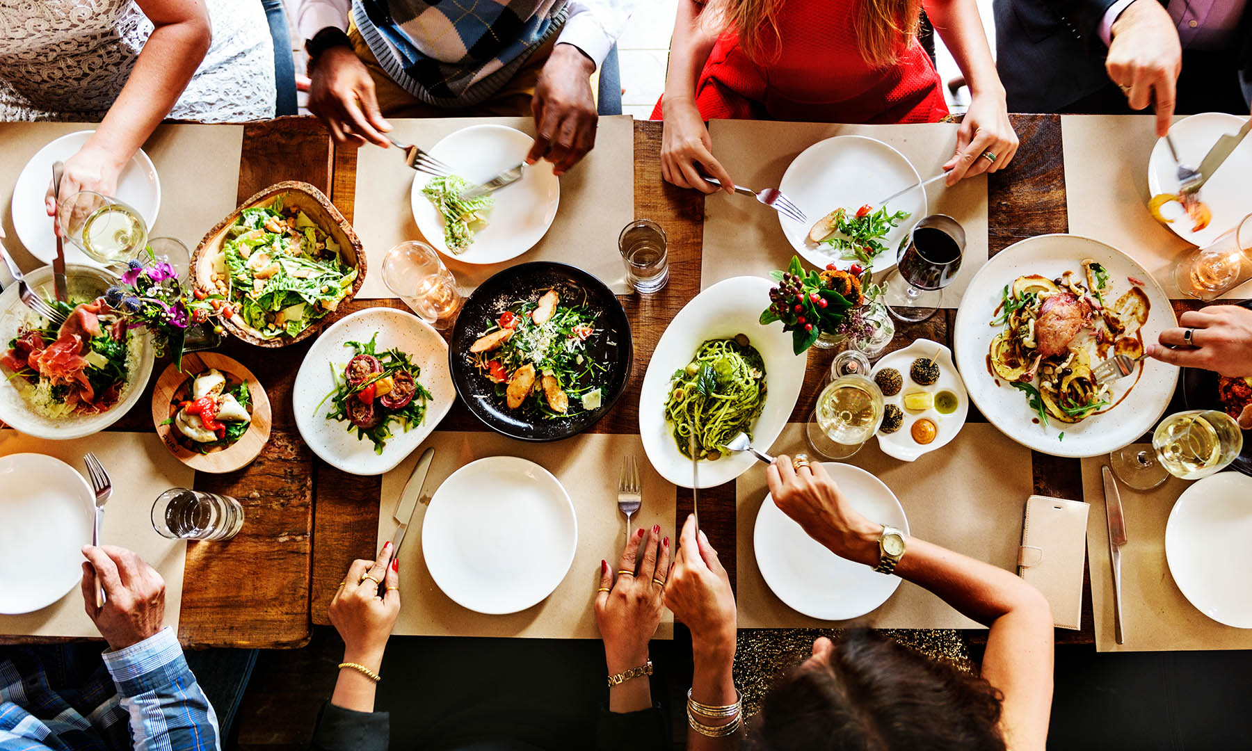 Overhead view of a table full of food