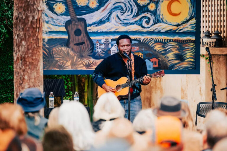 Musician performing at a songwriters festival