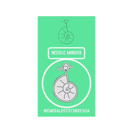 Emerald Stitchery branded shell logo needle minder accessory