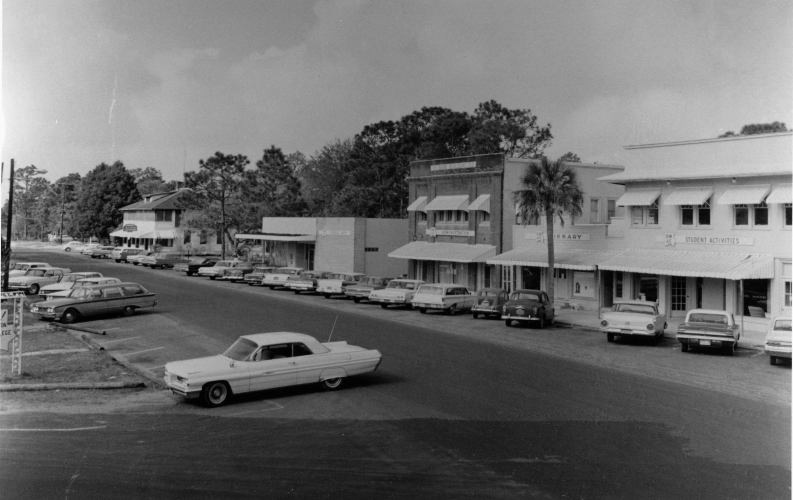 Historic black-and-white photograph on display at the Heritage Museum of Northwest Florida