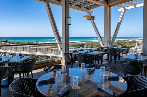 Balcony dining area overlooking the Gulf of Mexico at Fish Out of Water