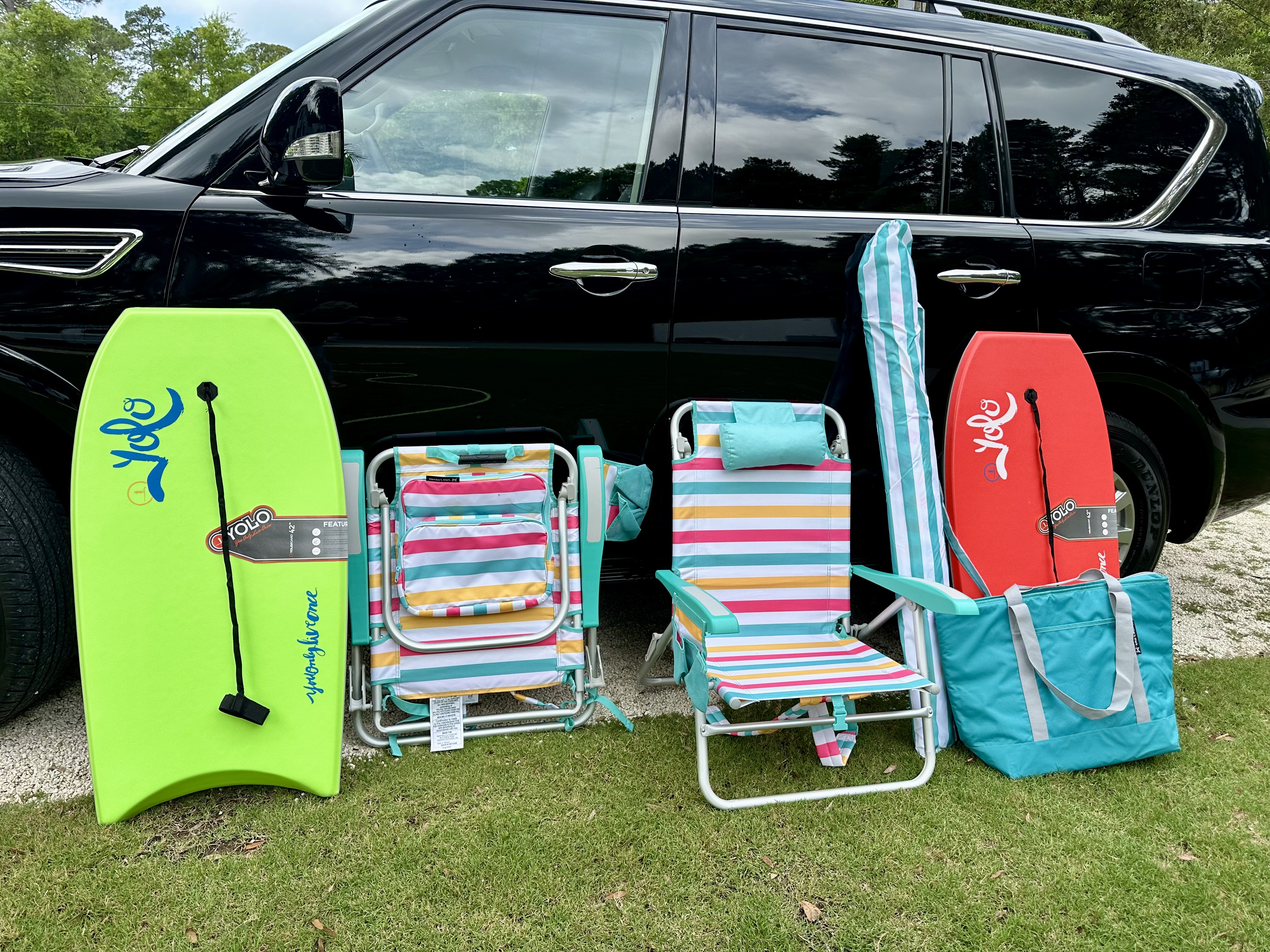 Beach chairs, umbrellas, wagon, cooler and boogie boards ready for delivery from The Rental Shop 30A