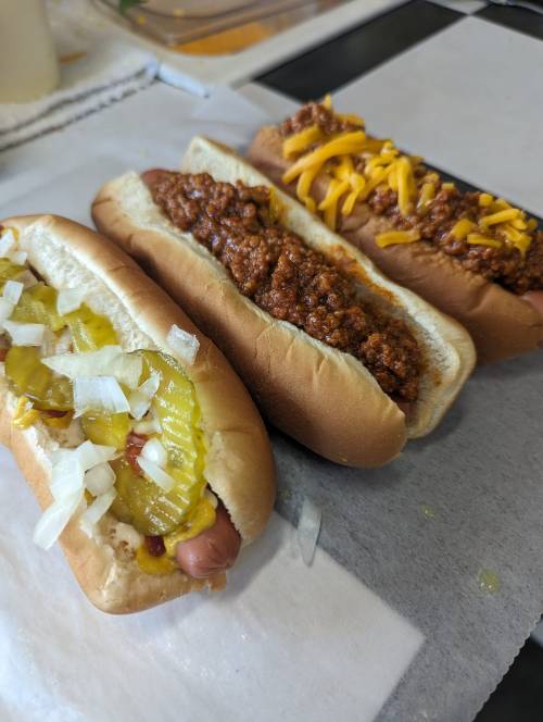 Hot dogs and burgers being prepared at H&M Hot Dogs in DeFuniak Springs