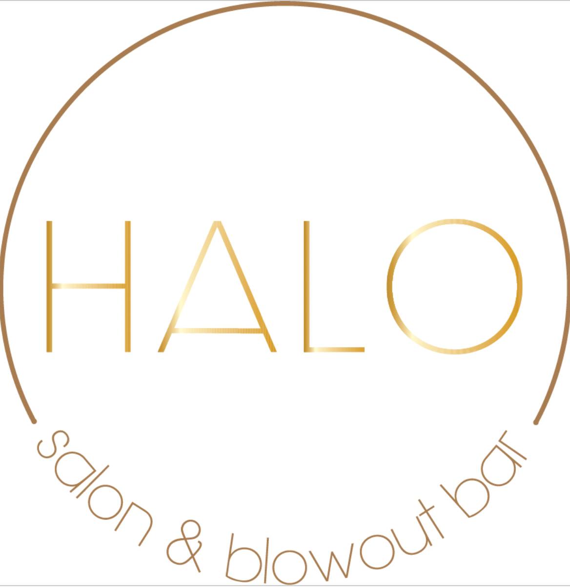 Stylist at work inside Halo Salon and Blowout Bar
