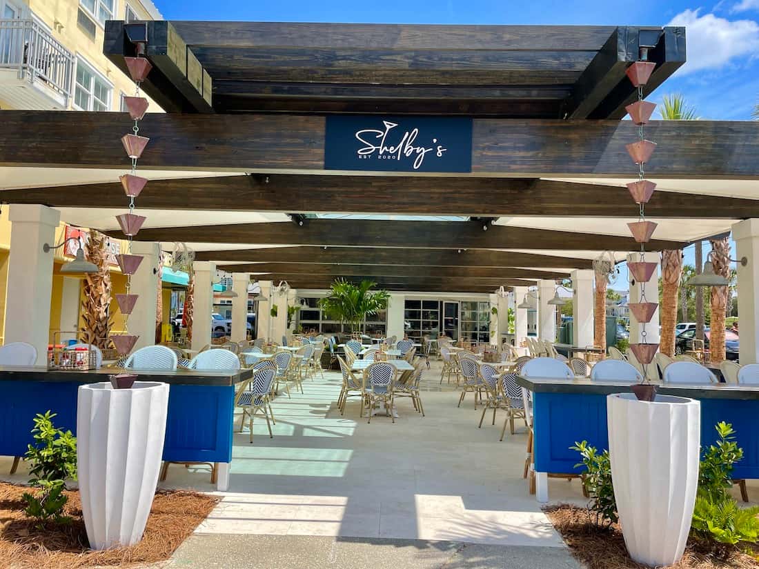 Outdoor covered patio dining area at Shelby's Beach Bar and Grill