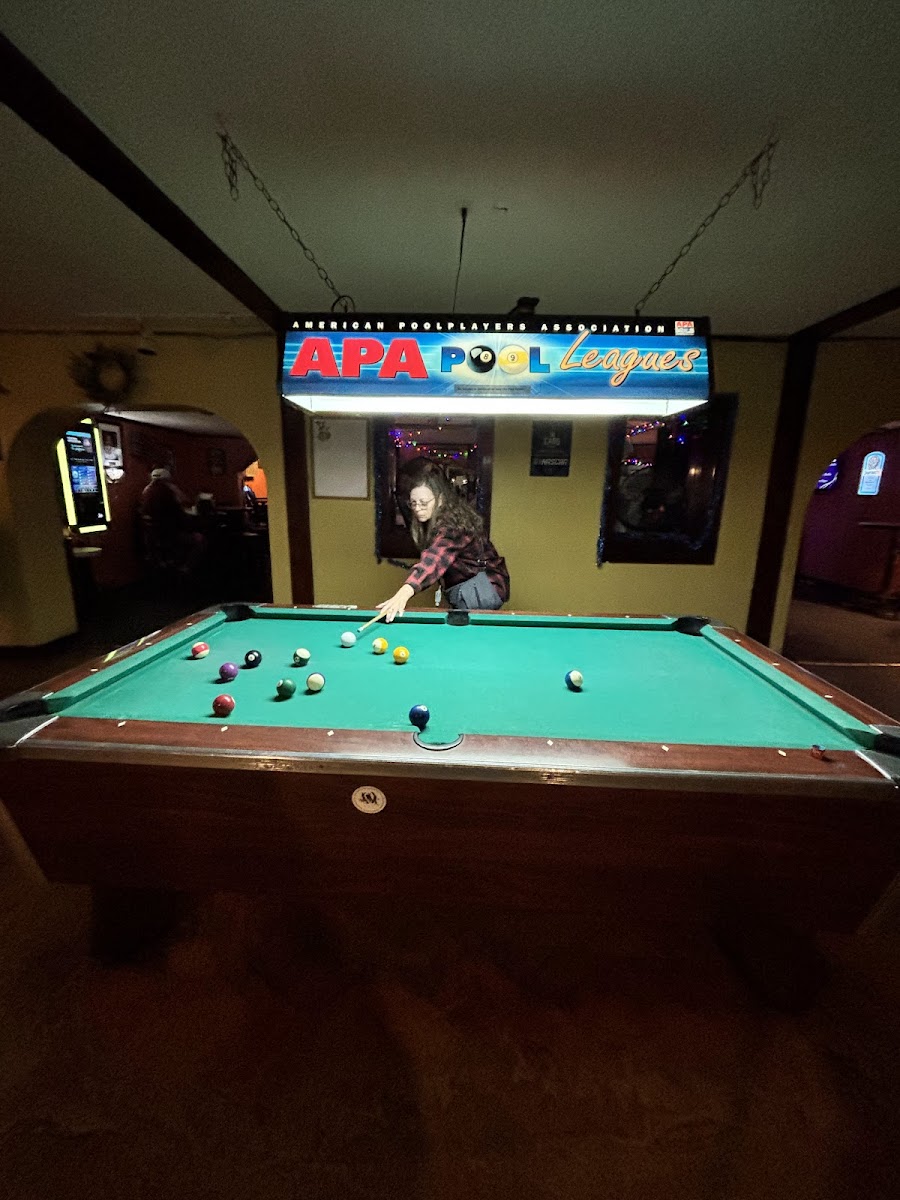 Pool tables and casual seating inside Papa Joe's Hideaway