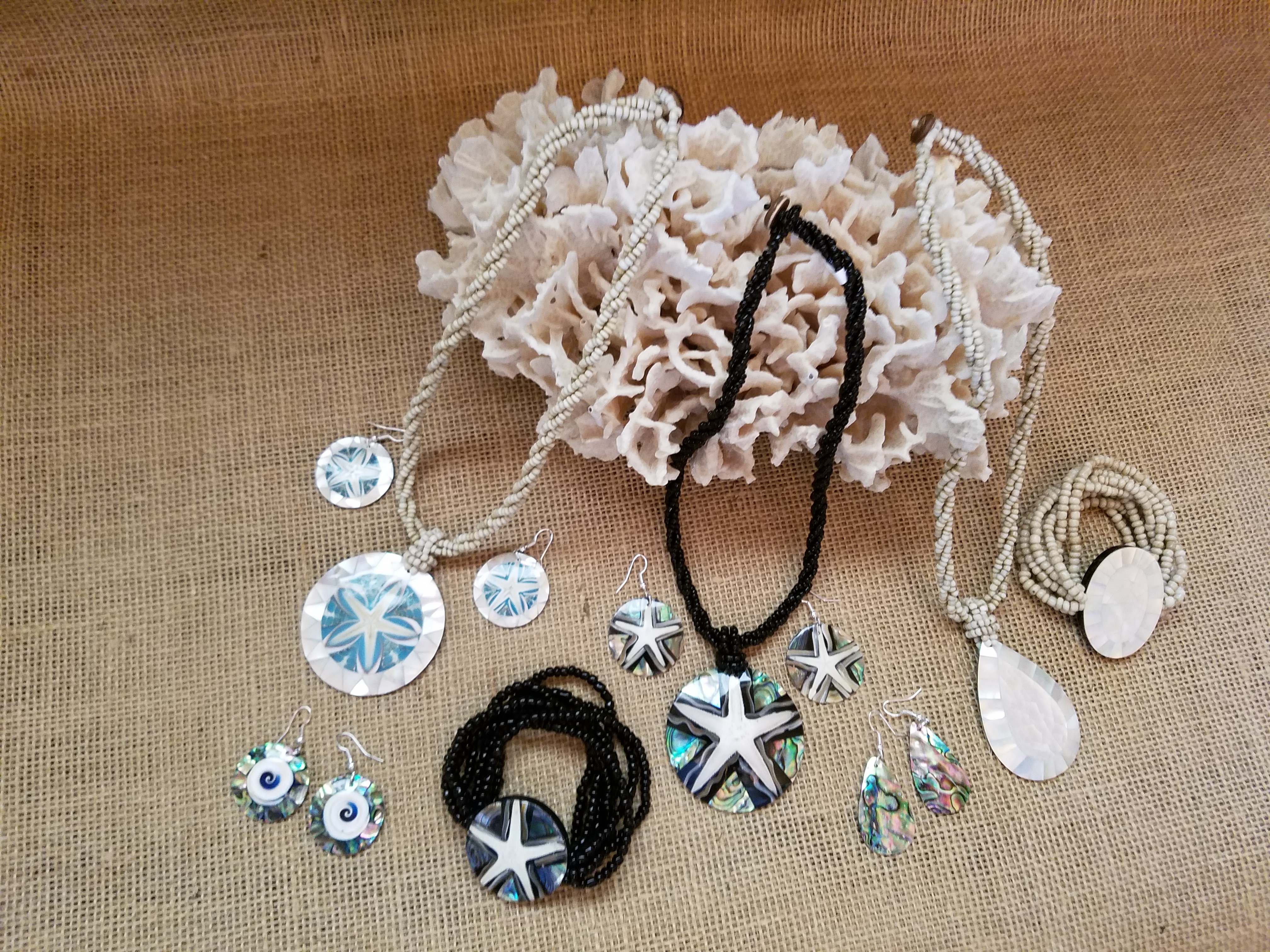 Shell jewelry pieces for sale at Bleu Tropics HarborWalk Village
