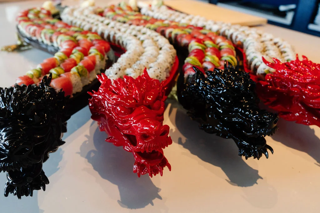 Artistic sushi dragon roll platter at Aja 30A