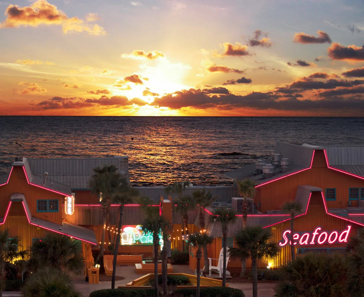 Gulf sunset view from The Back Porch Seafood and Oyster House deck