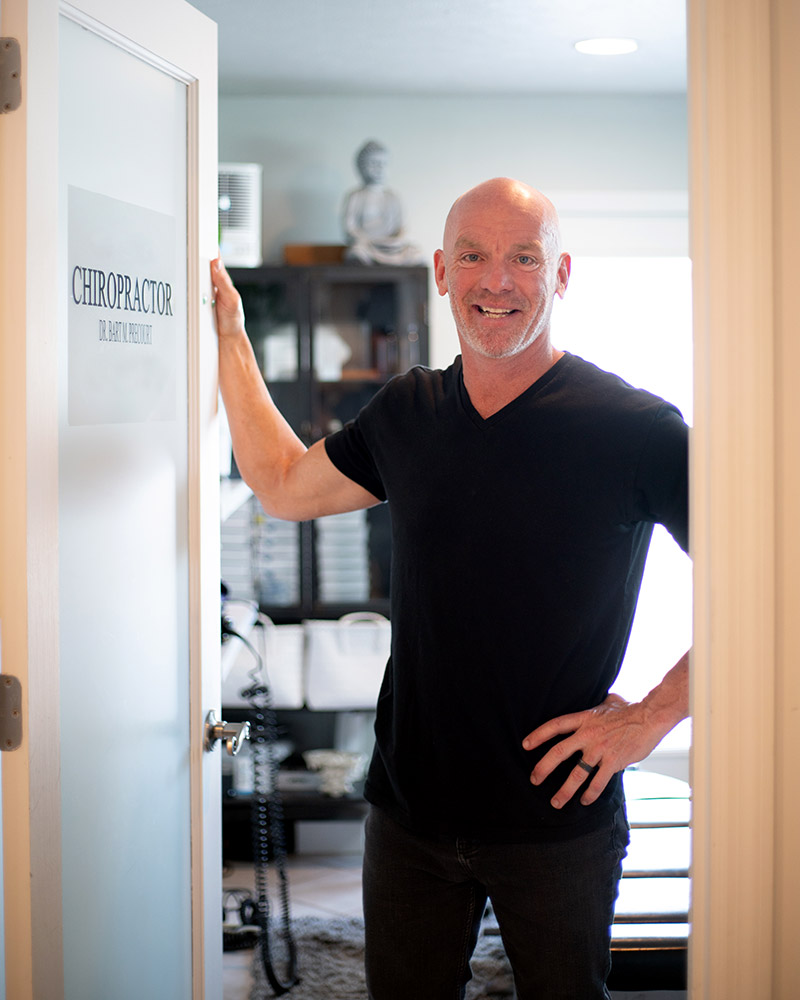 Dr. Bart Precourt providing chiropractic care at Balance Health Studio in Seagrove Beach
