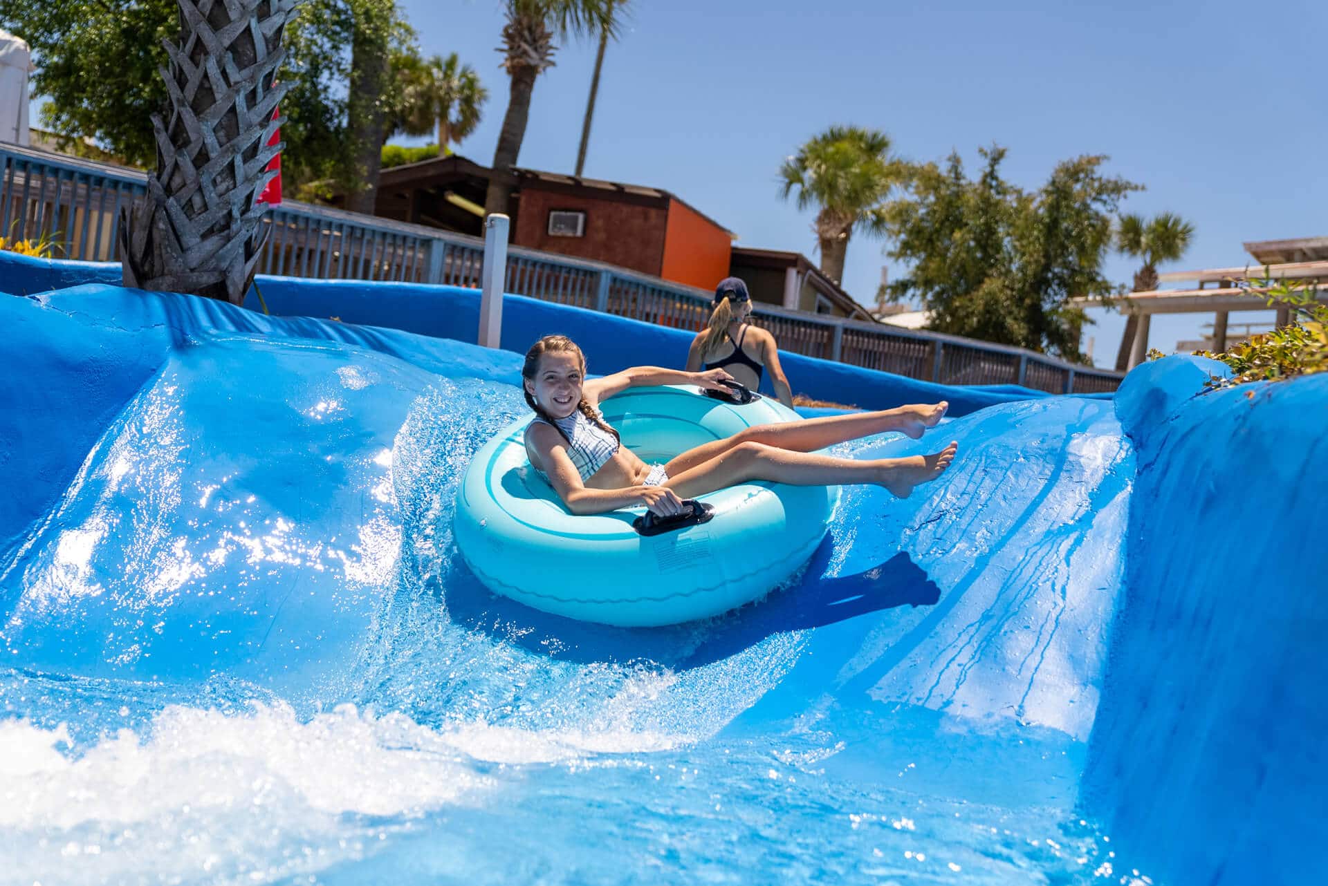 Guests enjoying water slides and pools at Big Kahuna's in Destin