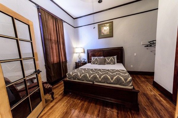 Casablanca Suite guest room with king bed at Hotel DeFuniak