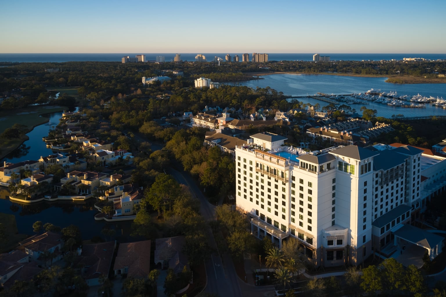 Aerial view of Hotel Effie Sandestin between the Gulf of Mexico and Choctawhatchee Bay