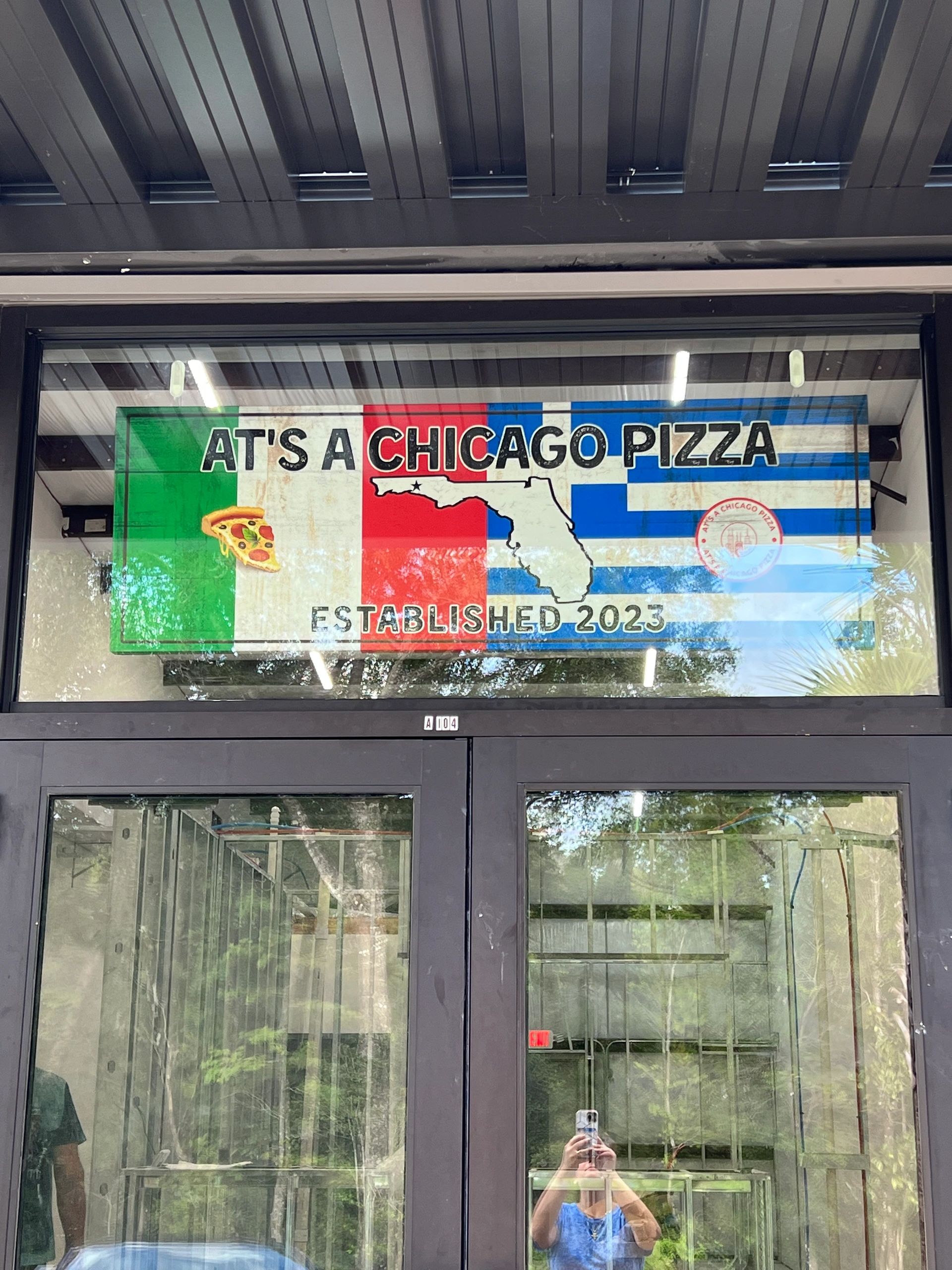 Storefront of At's A Chicago Pizza in Freeport, Florida
