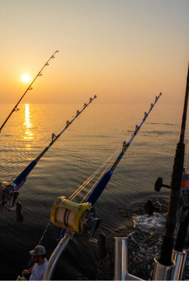 Fishing rods rigged and ready aboard a Panama City Beach charter boat