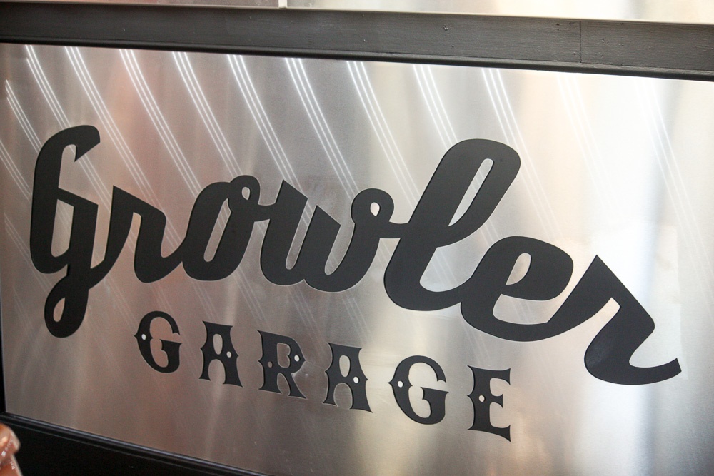 Growler Garage patio seating across from the beach in Santa Rosa Beach