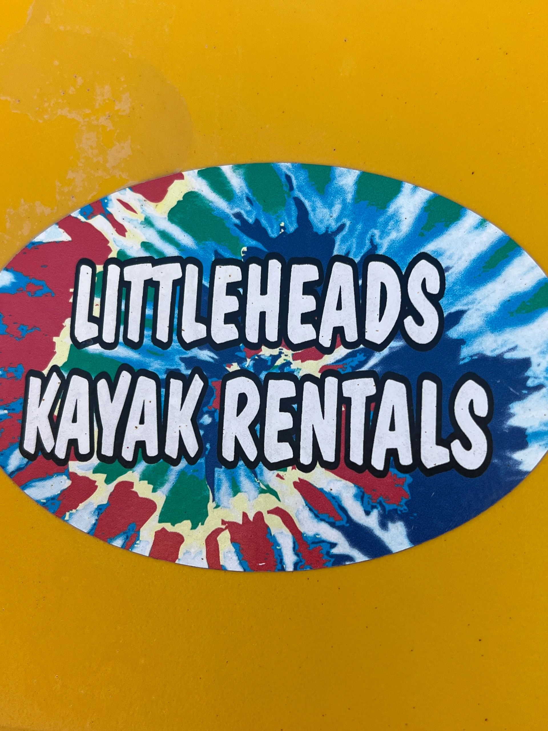 Kayaks and paddleboards ready to rent from Littleheads Kayak Rentals on Perdido Key