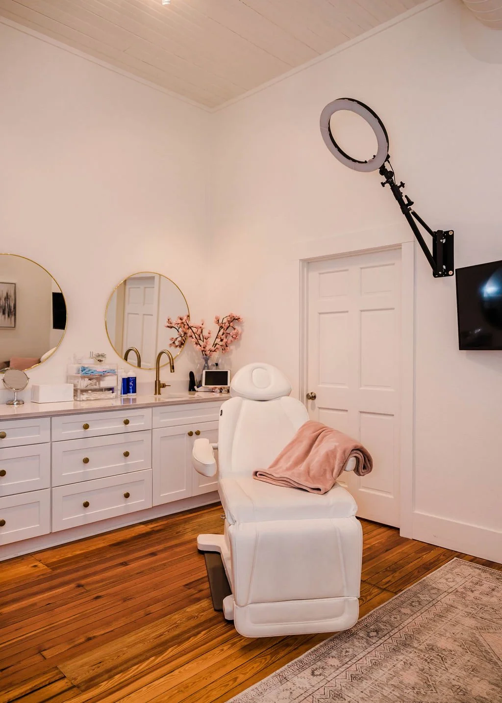 Treatment space inside The Pink House Aesthetics & Wellness boutique on Baldwin Avenue
