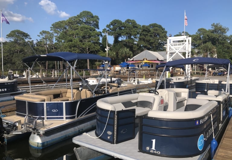 Pontoon boat rental at Baytowne Marina, part of Sandestin Golf and Beach Resort