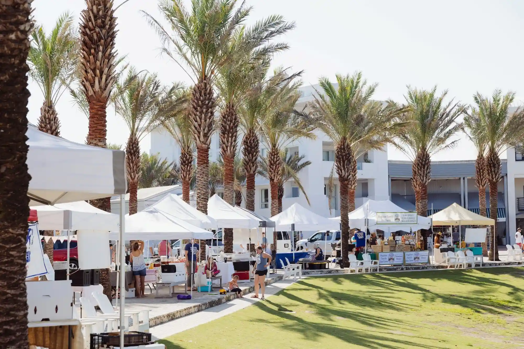 Seaside Farmers Market vendor tents set up on the Seaside Amphitheater lawn