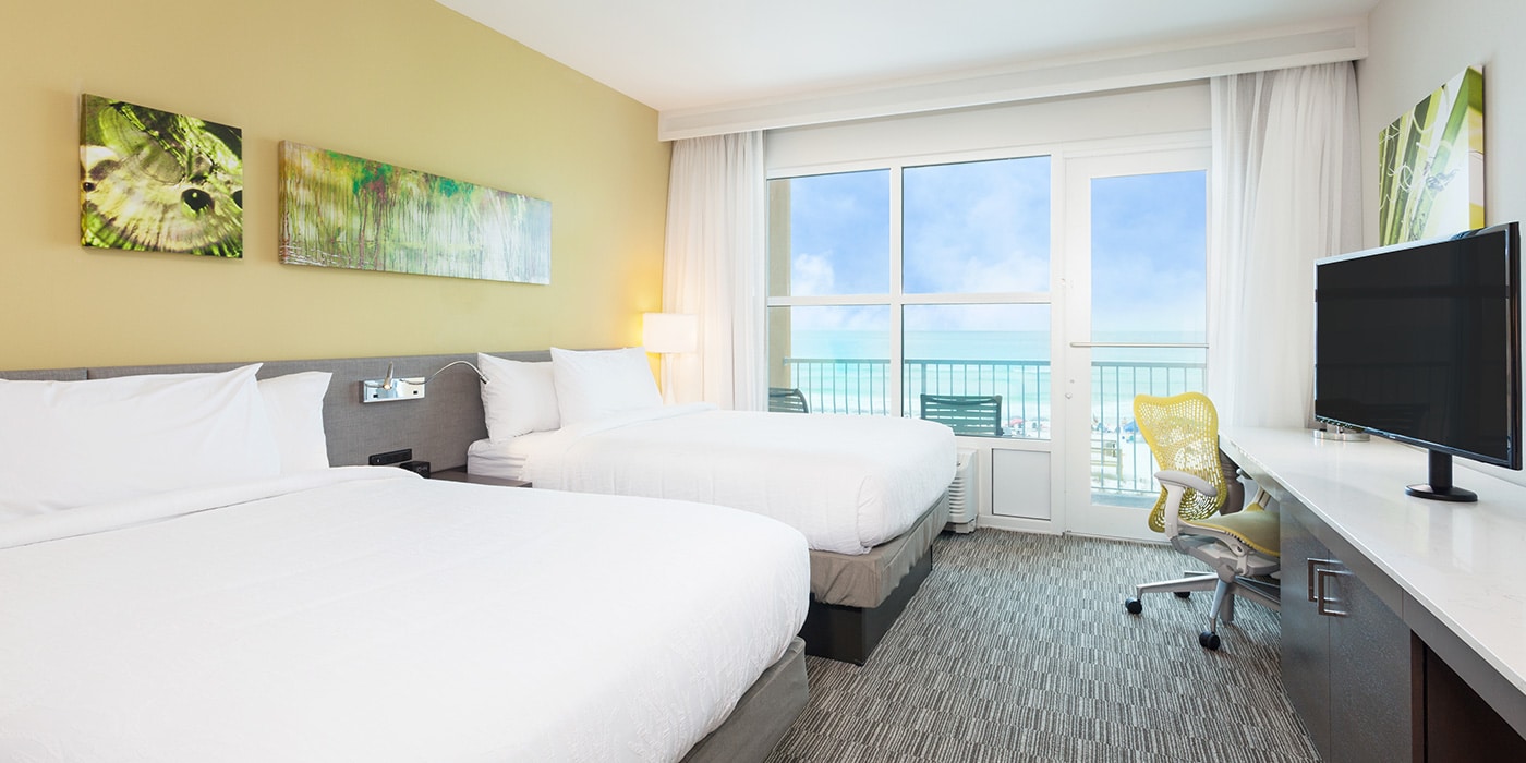 Gulf-front guest room with balcony at Hilton Garden Inn Fort Walton Beach