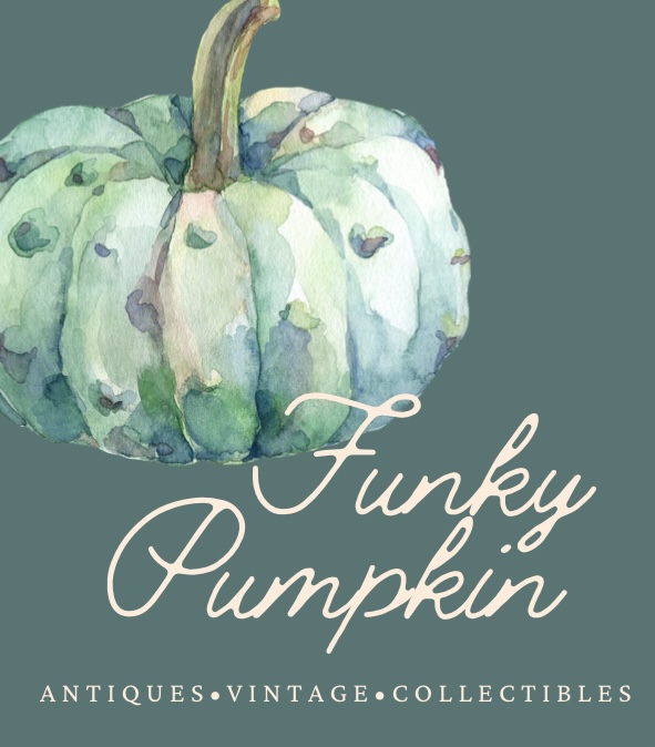 Vintage items and collectibles arranged in a dealer booth at Funky Pumpkin