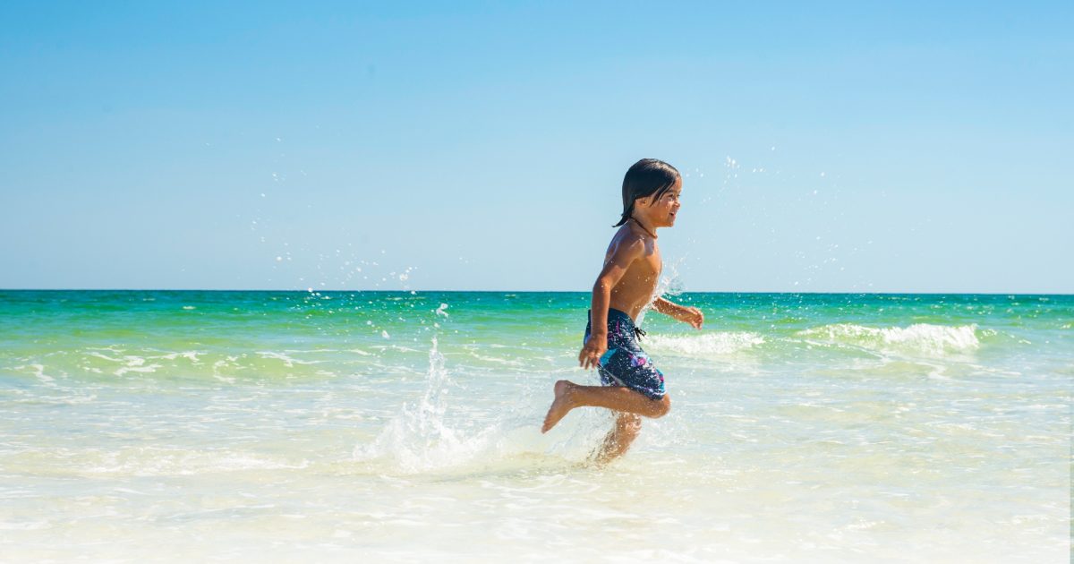 White sand beach and turquoise Gulf water on Pensacola Beach