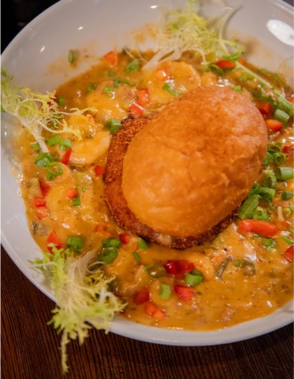 Plated seafood entree at Big Easy PCB on Thomas Drive