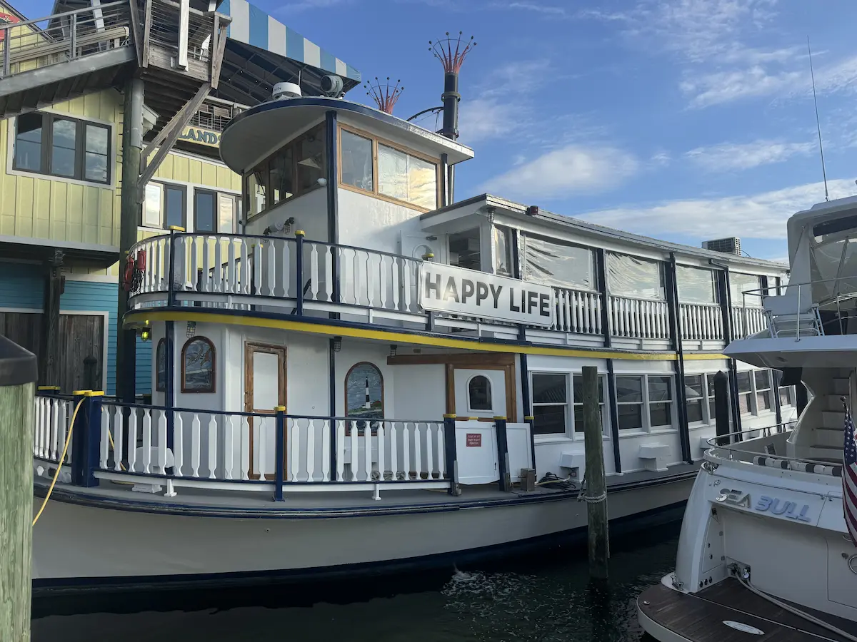 Happy Life Cruises riverboat on the Destin Harbor during the day