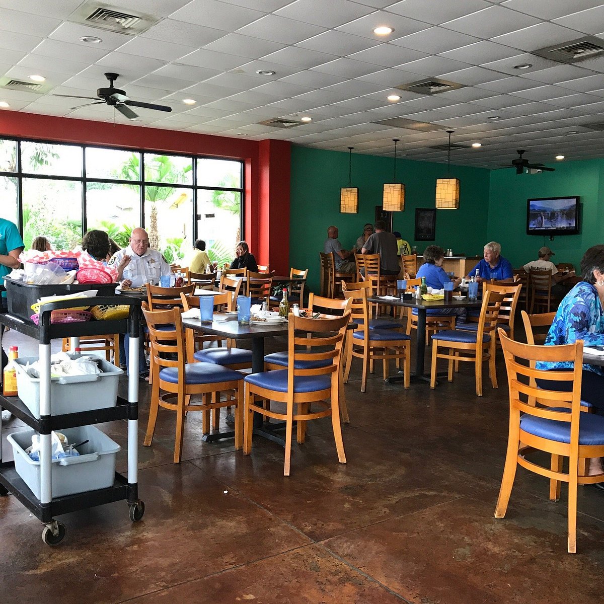 Busy interior dining room at Holiday Restaurant in Bonifay, Florida during lunch service