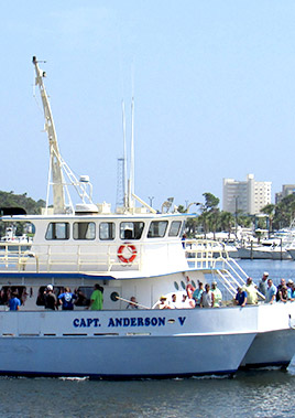 The Capt. Anderson V headboat docked and ready for a deep sea fishing trip