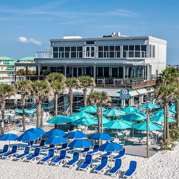 Beachfront dining scene featured on the Casino Beach Bar and Grille website