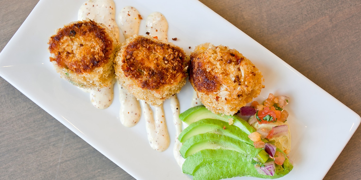 Crab cakes served at Riptides Sports Grill and Tiki Bar