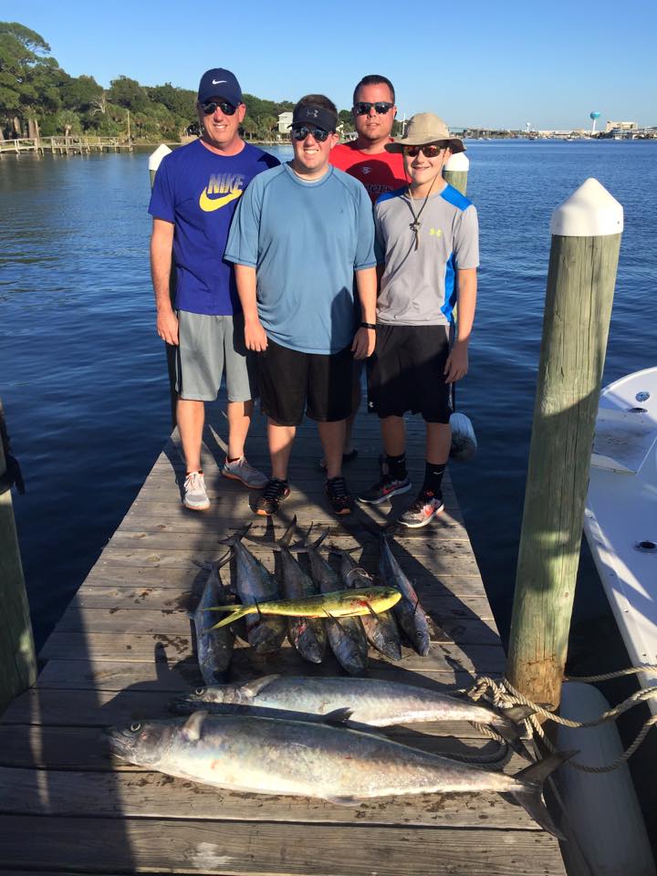 Anglers with their catch aboard a One Shot Charters fishing trip near Fort Walton Beach