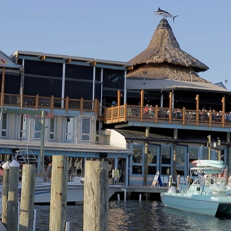 Exterior of AJ's Seafood and Oyster Bar on Destin Harbor