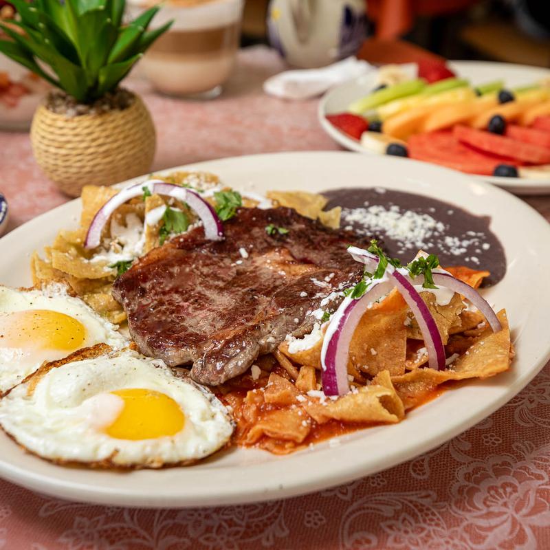 Grilled ribeye steak served with eggs at Buenos Dias Cafe in Gulf Breeze