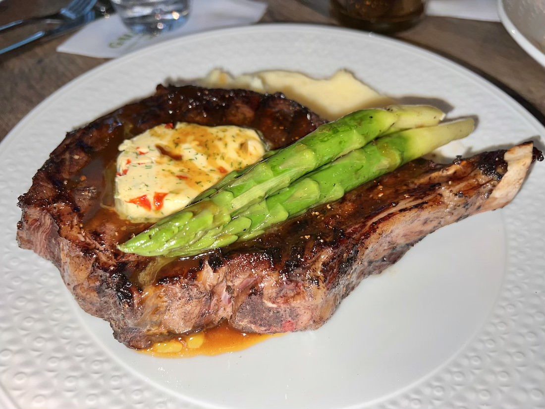 Dry-aged ribeye steak dish served at Gallions in Rosemary Beach