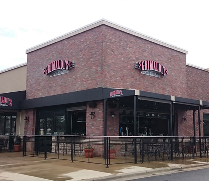 Grimaldi's Coal Brick-Oven Pizza storefront on Grand Boulevard in Miramar Beach