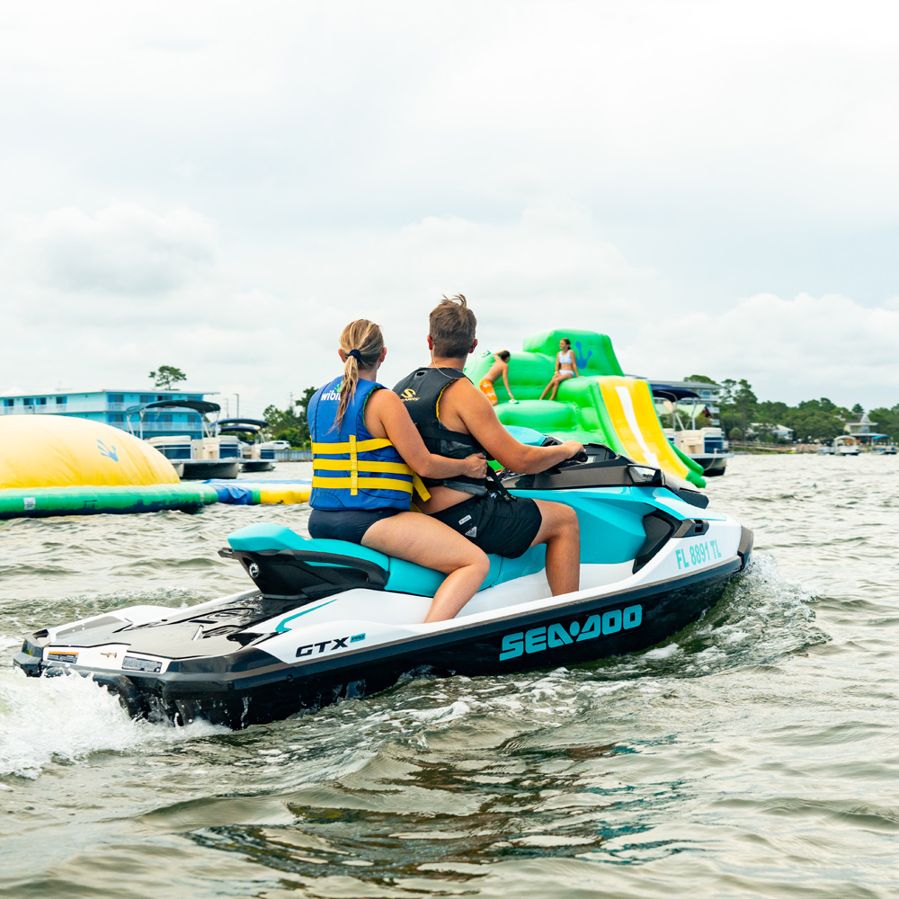 Waverunners and jet skis lined up for rental at Navarre Family Watersports