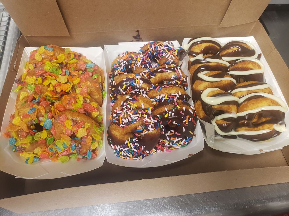 Counter display of donuts and treats at Annabel's Donuts in Crestview, Florida