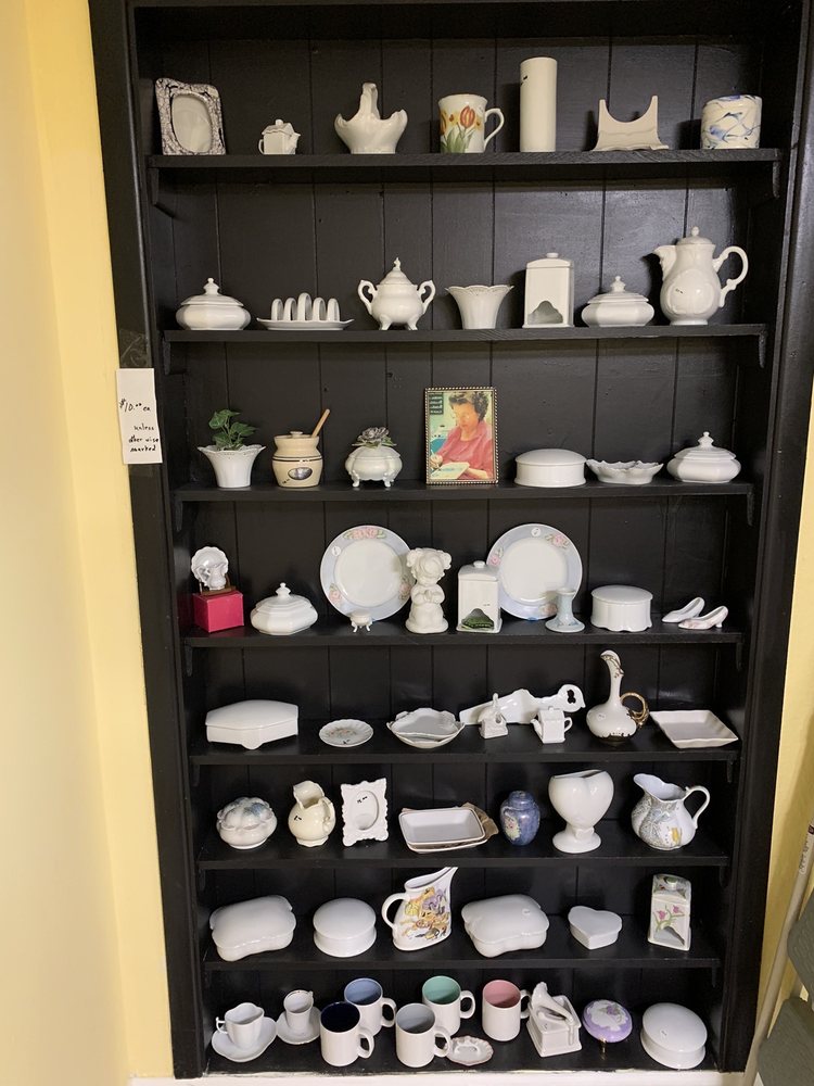 Interior view of the used bookstore and gift shelves at Anita's Half and Half