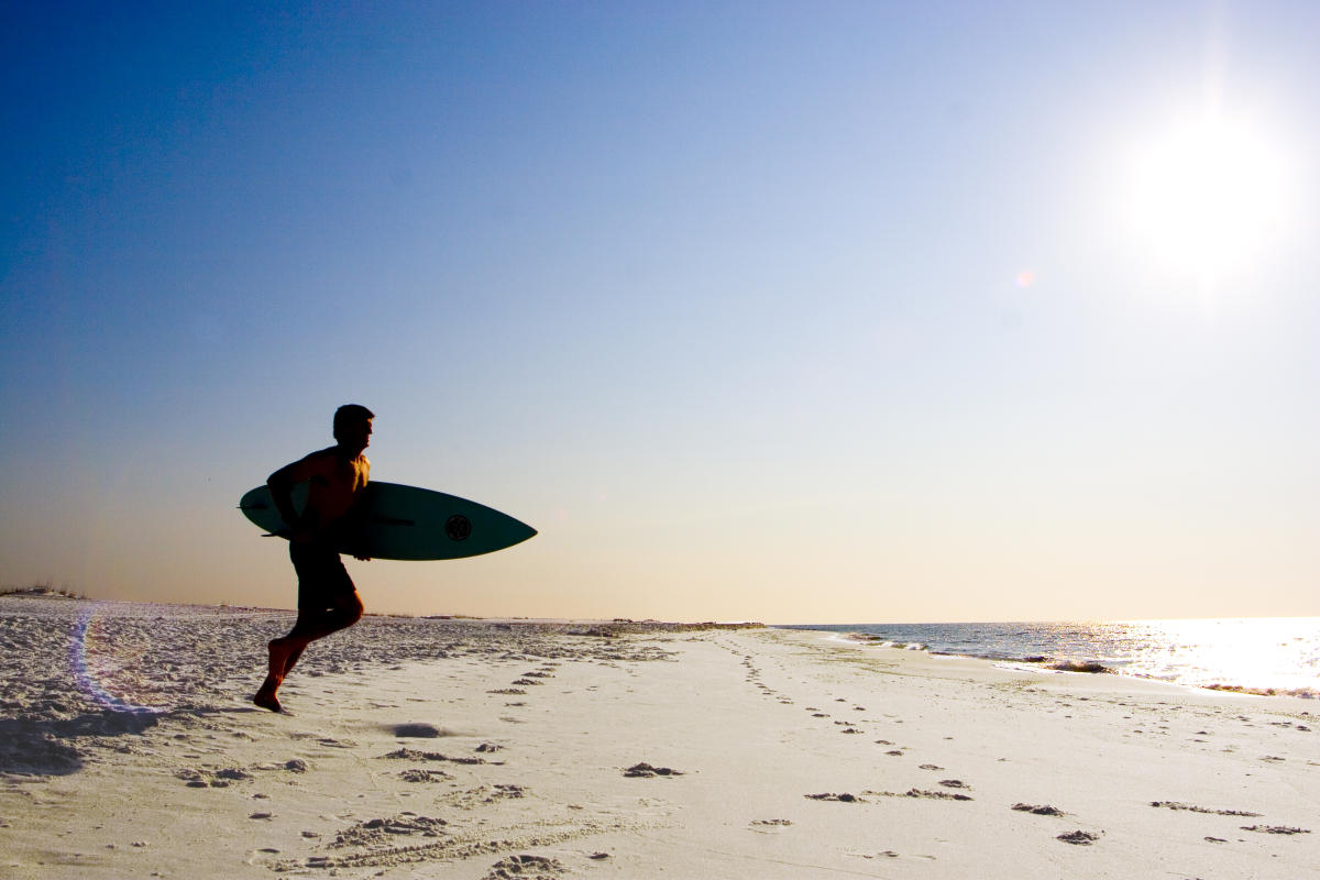 Family enjoying the beach on Perdido Key, Florida, near the Old River waterfront