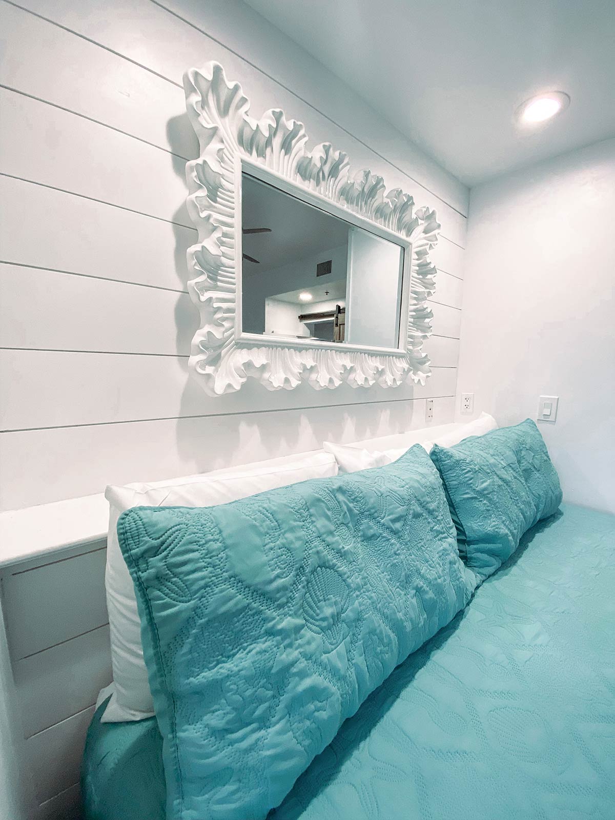 Deluxe King Room interior at Carillon Beach Resort Inn with kitchen and living area