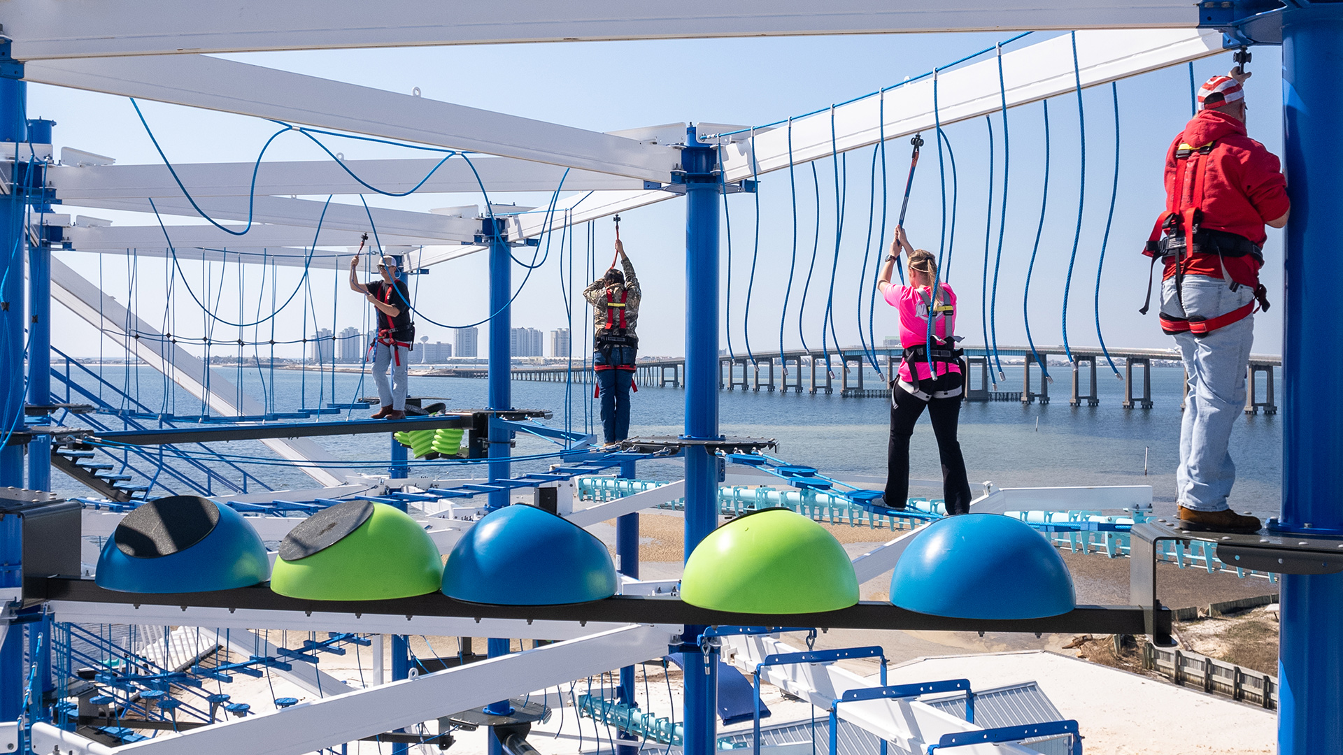Ropes course and zip line obstacles at Navarre Family Watersports