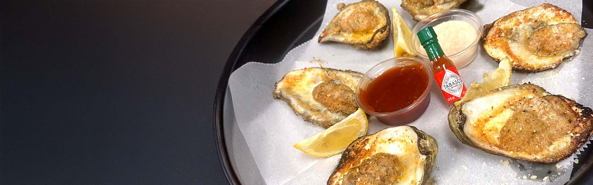Chargrilled Gulf oysters served at Scooter's Fish House in Navarre