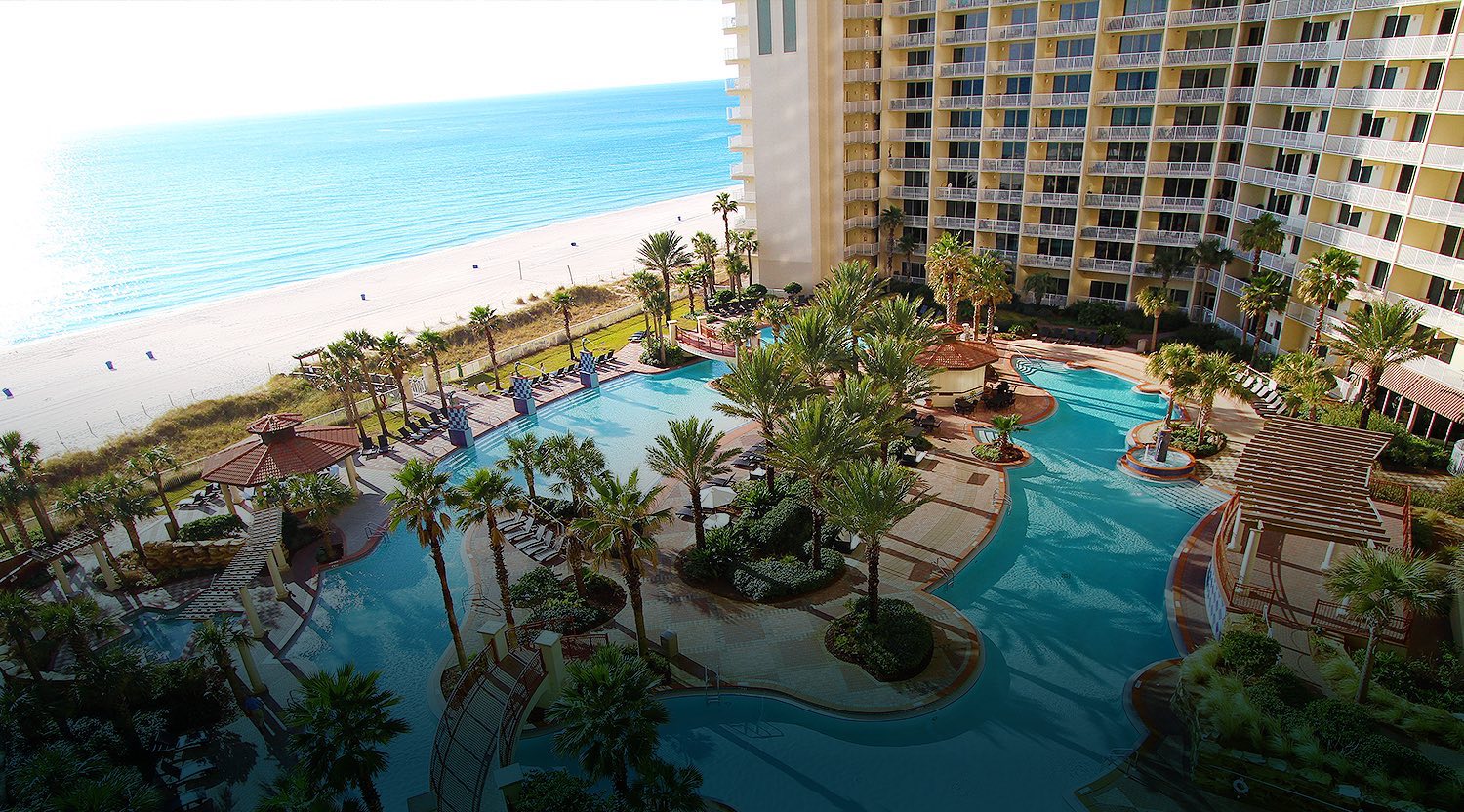 Aerial view of the lagoon-style pool at Shores of Panama overlooking the Gulf of Mexico