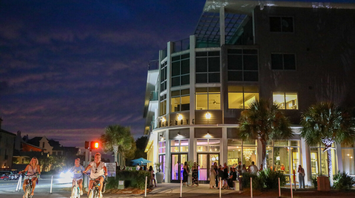 Surfing Deer restaurant exterior lit up at night in Old Seagrove