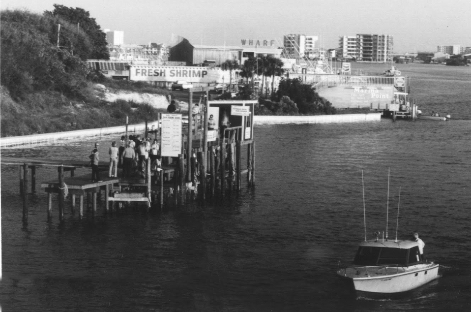 Historic photo of the Destin fishing wharf tied to the Destin family's fishing heritage