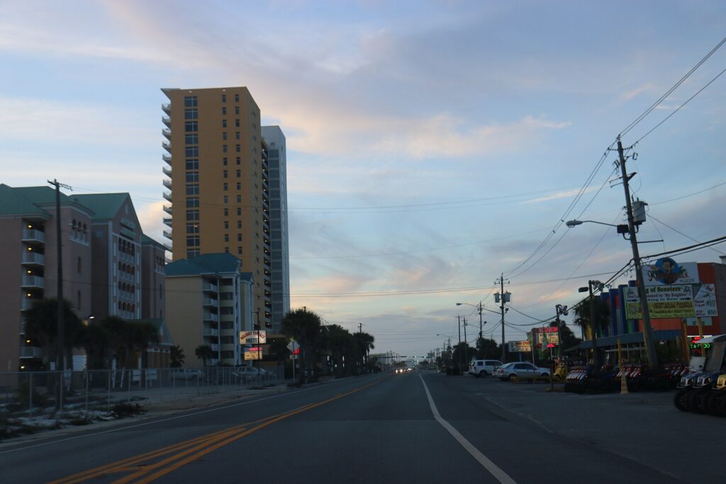 Condo towers along Front Beach Road in Panama City Beach at dusk