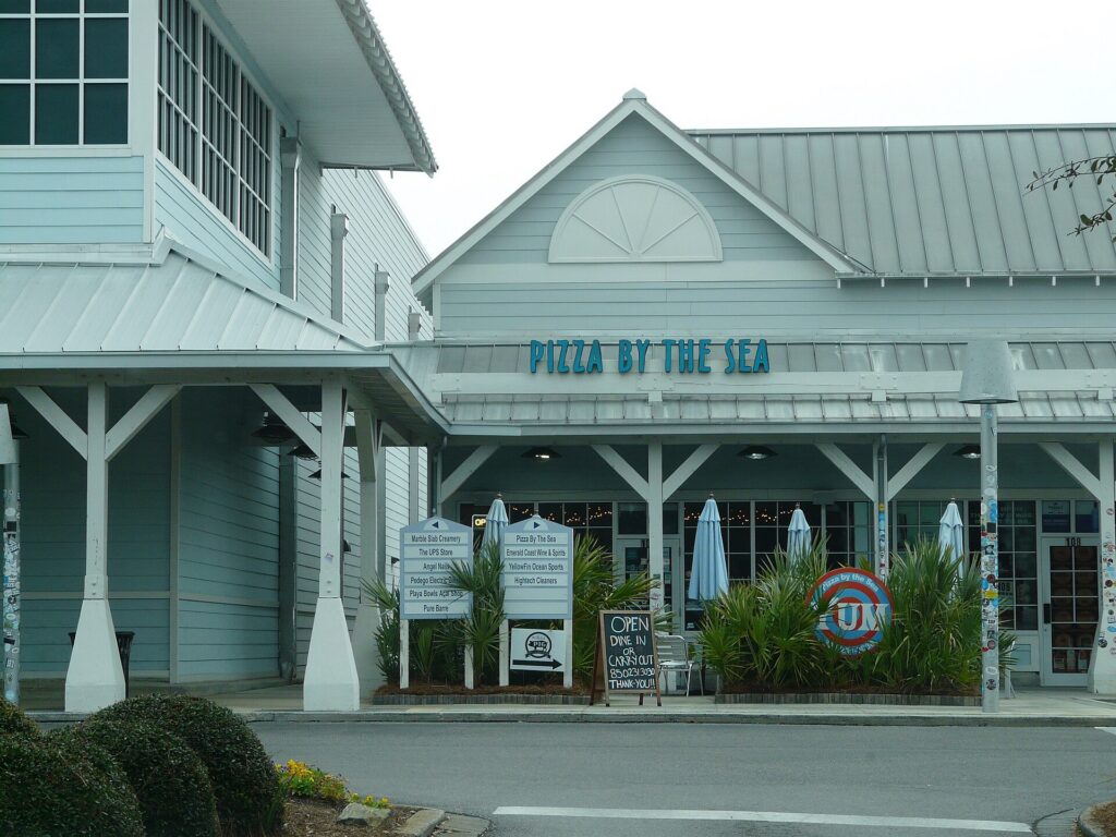 Pizza by the Sea storefront at WaterColor Crossings on Scenic Highway 30A